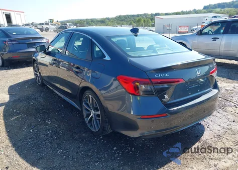 2023 Honda Civic Touring z USA, uszkodzony, nr VIN 2HGFE1F94PH321019